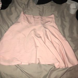 Light pink mini skater skirt never worn!